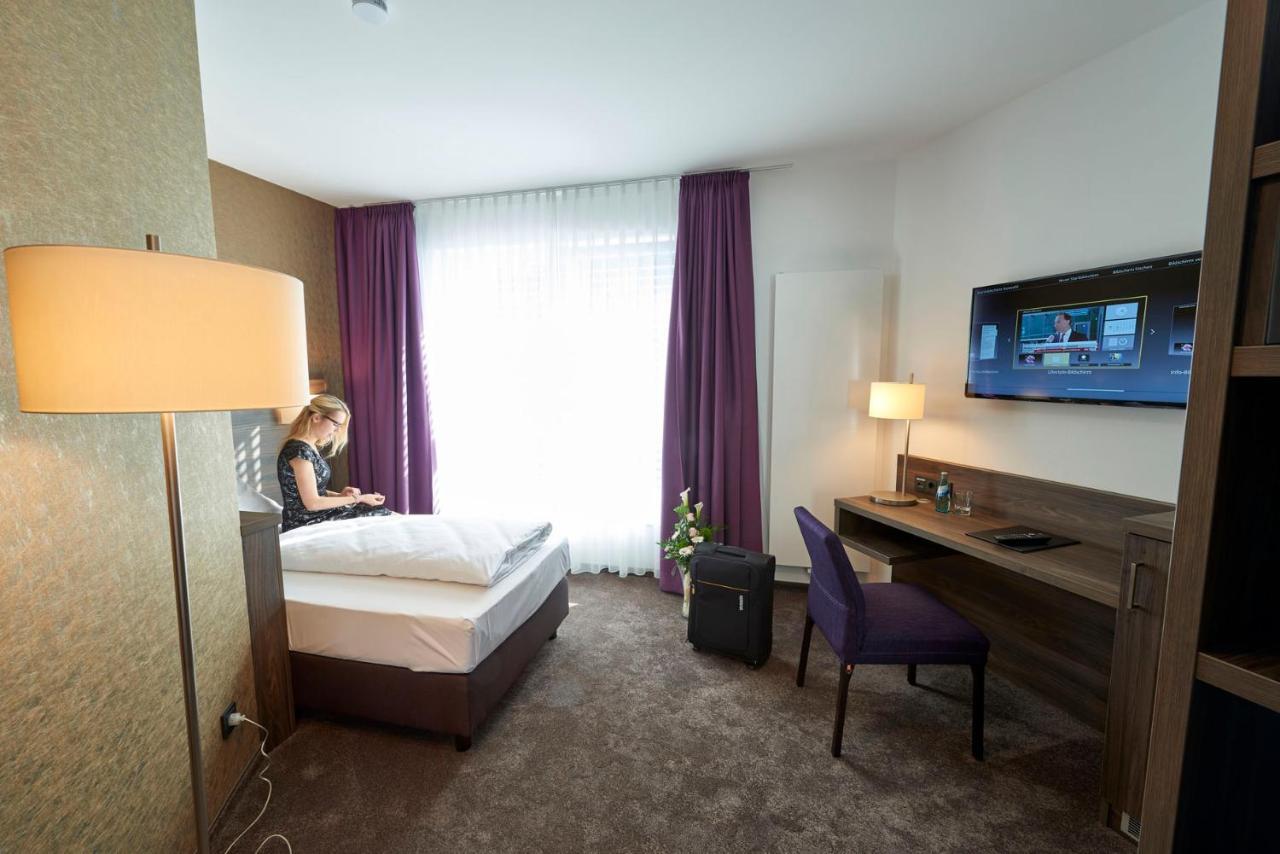 Hotel Muehlenhof Lollar ภายนอก รูปภาพ